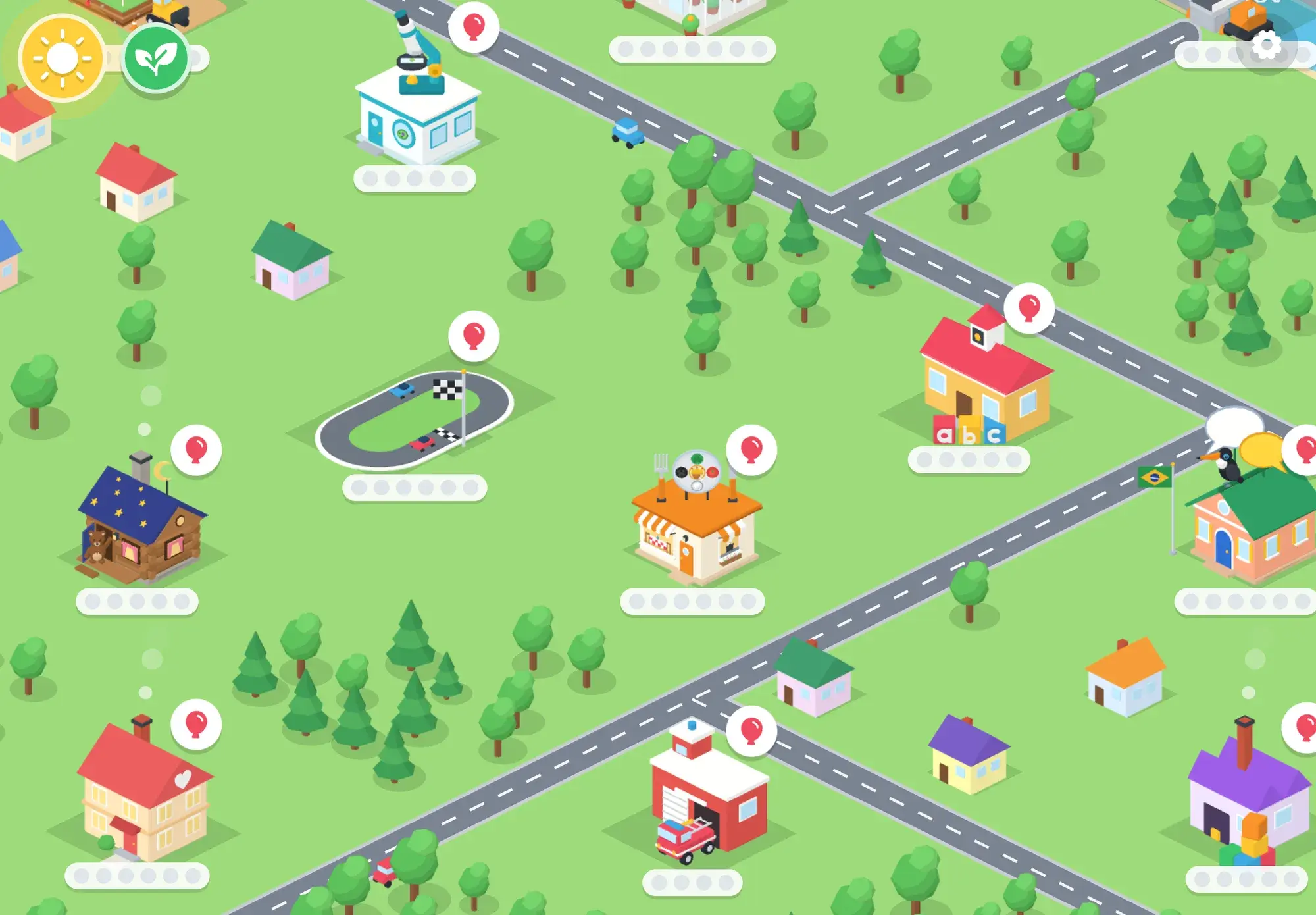 A corner of the 3D town with Bo's log cabin, the race track, the bistro, the school with abc blocks, the language school and the fire station
