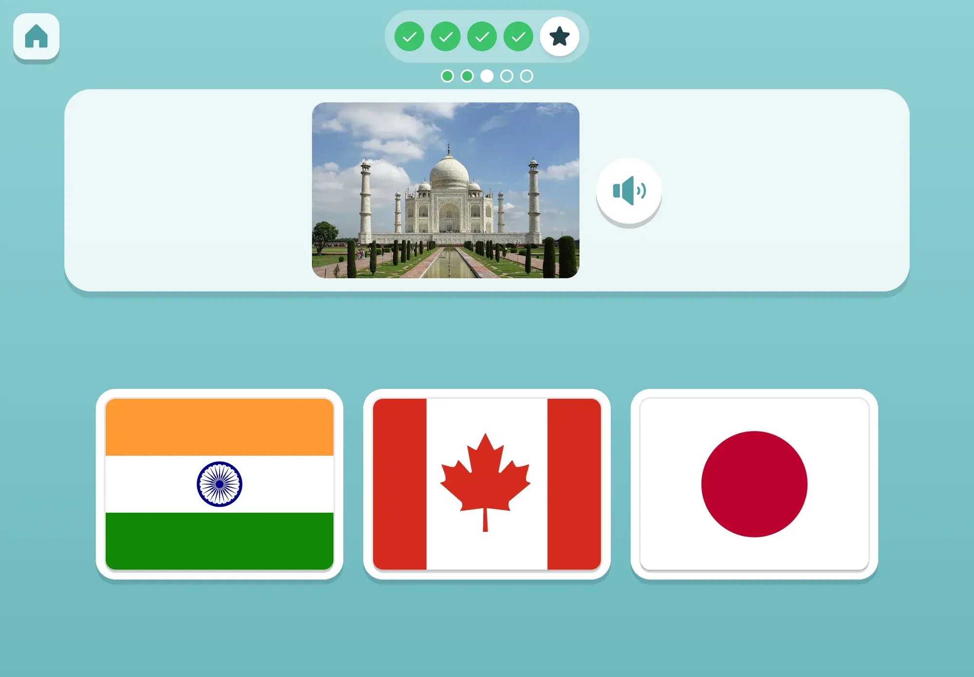 A photo of the Taj Mahal above the flags of India, Canada and Japan, waiting for the child to pick the right country